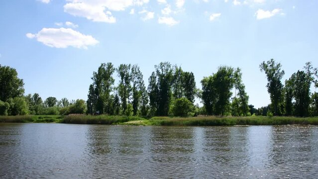 sliding along the landscape of the banks of the Elbe river near Magdeburg, Germany