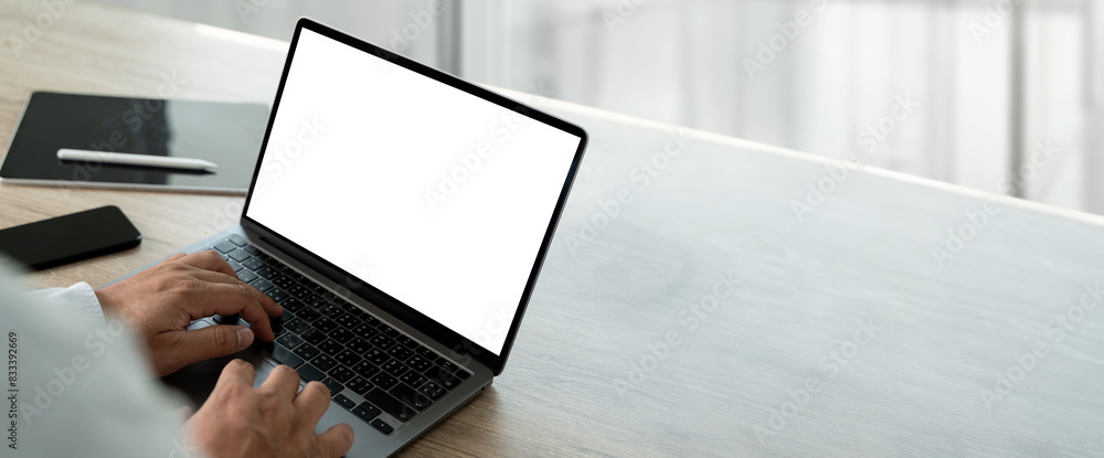 Poster businessman using computer with empty blank screen in office marketing and design background for adv