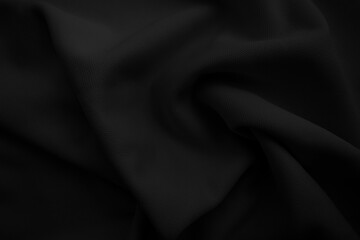 Black cloth blackground. Dark wavy fabtic.