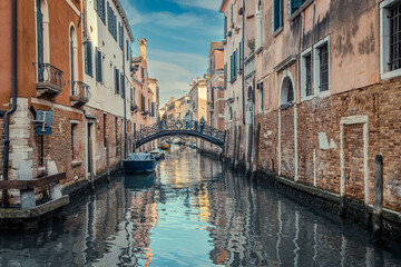 perspective view of venetian bridge over canal