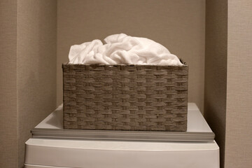 Used towel in laundry basket