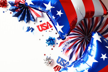 4th of July Independence Day of the USA concept. Top view foil balloons and decor on white...