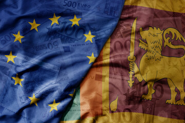 big waving realistic national colorful flag of european union and national flag of sri lanka on a...