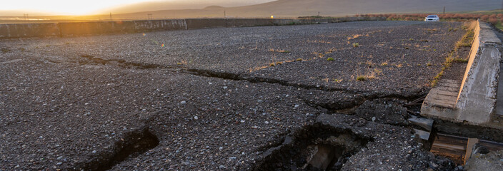 Cracked old asphalt, road safety concept