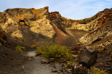 Hiking trail to Cuervo volcano. Interior the Cuervo volcano. Los Volcanes Natural Park, Lanzarote, Canary Islands, Spain
