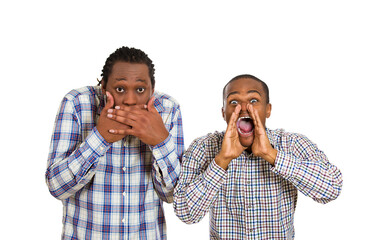 Portrait of two men, workers, friends, one being noisy, screaming, yelling, second quiet, calm, covering mouth with hands 