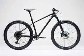 Fototapeta premium A black mountain bike with a black seat and black handlebars