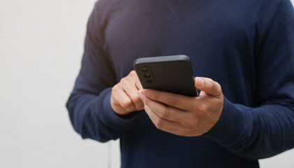 close up teenager man hand use smartphone to online on social media network for lifestyle and technology concept