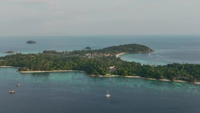 The tropical island  with seashore as the island in a coral reef ,blue and turquoise sea Amazing nature landscape with blue lagoon	