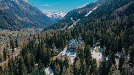 Aerial view of Savoy Castle situated in Gressoney-Saint-Jean, Italy. It was a summer residence of the queen Margherita of Savoy. Tourist attraction in the Aosta Valley, Italian Alps.