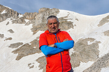 Mountaineer is posing in front of the summit, Antalya