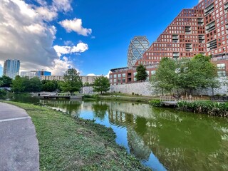 Buildings and landscape reflecting on a lake