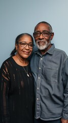 Obraz premium Two individuals, a Black man, and a Black woman, standing side by side in an indoor setting