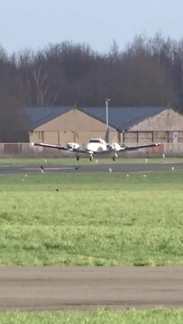 Twin Engine Airplane Landing at a Regional Airport (Flight School Learning pilot training)