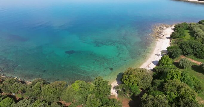 The rocky coastline with pebble beach in Istra peninsula, Adriatic Sea in Croatia