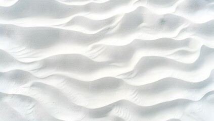 Obraz premium white sand texture with wave patterns, top view