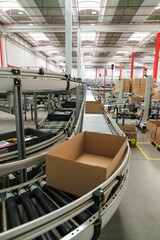 conveyor conveyor belt in factory. packing line in a logistics warehouse - ecommercebelt in factory