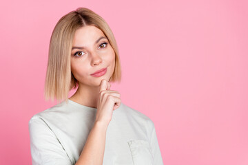 Portrait of nice young lady think wear t-shirt isolated on pink color background