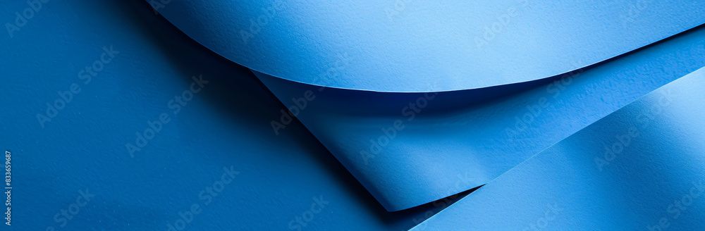 Poster a blue background with an empty paper for copy space.