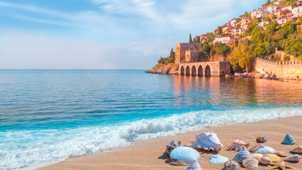 Beautiful sandy beach and soft turqoise Mediterranean sea wave - Landscape of ancient shipyard near...