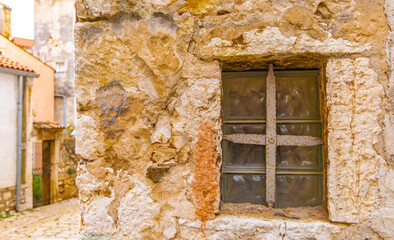 Windows in an old medieval prison building