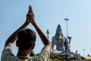 men Devotee Praying at Hindu Temple murudeshwar