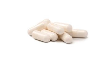 White pill capsule isolated on a white background.