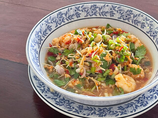 Yum,Thai traditional spicy prawn salad menu or Thai food ,Fresh with herbs Salad.