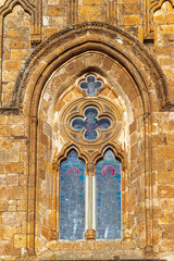Mullioned window on the facade of Valverde sanctuary in Iglesias. Sardinia, Italy