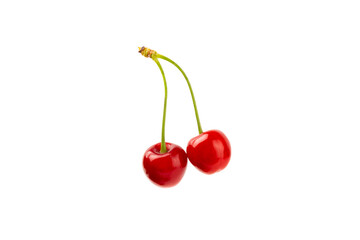 Cherry isolated. Fresh ripe cherries with leaves isolated on a white background.Sweet cherries pile. Berries and fruits. Vegan. Healthy eating.