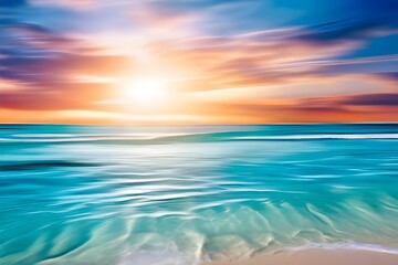 Obraz premium A stunning sunset over the ocean, with waves crashing against the shore.