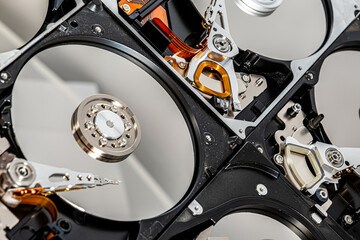  Disassembled hard drive from the computer, hdd with mirror effect. Opened hard drive from the...
