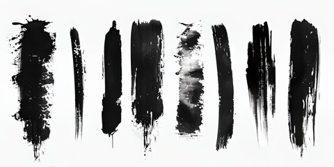 a set of black ink paint strokes on a white background