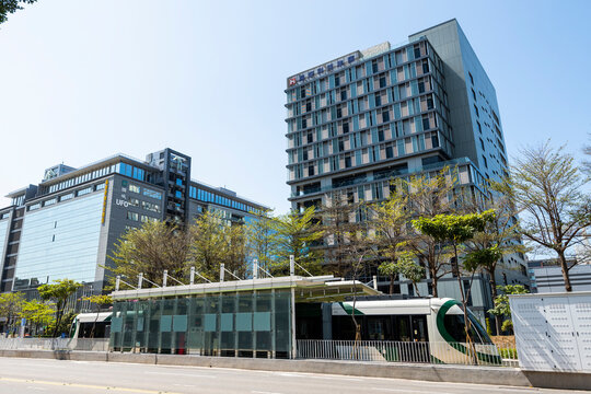 Kaohsiung, Taiwan- March 11, 2022: The circular light rail train stops at the Software Technology Park station in Kaohsiung, Taiwan.