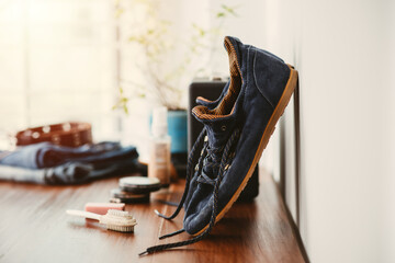 Cleaning the suede shoes.