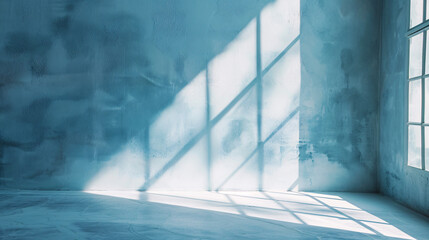 Obraz premium Abstract light blue backdrop with window light and shadow on plaster, minimalist product setting