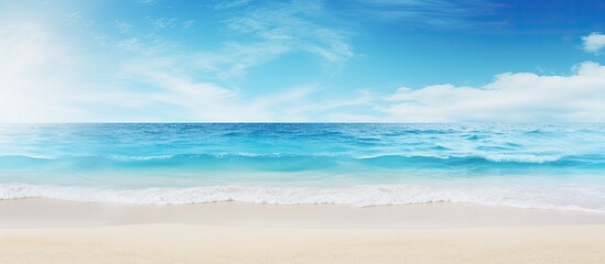 Obraz premium Summer holiday background concept with a blurred blue ocean and sky, perfect for copy space image.
