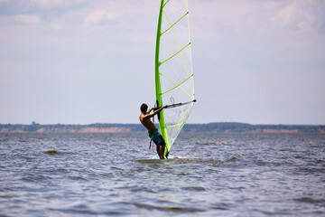 Windsurfer passing by