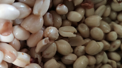 Peanuts are being peeled