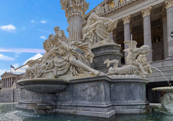 Fountain and statue in front of the Austrian parliament building, Vienna, Austria