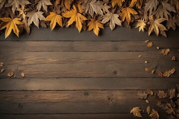 Obraz premium autumn leaves on wooden background