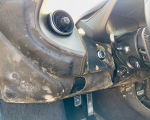 Car interior after flooding. Traces of mold in the car interior after water exposure. Damaged car...