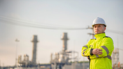 Asian man petrochemical engineer working at oil and gas refinery plant industry factory,The people worker man engineer work control at power plant energy industry manufacturing