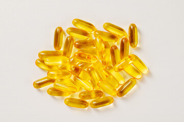 Capsule of omega 3, 6, 9 fish oil, vitamin isolated on white background. 