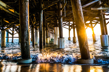 Beneath the pier along the east coast of Florida in Cocoa Beach
