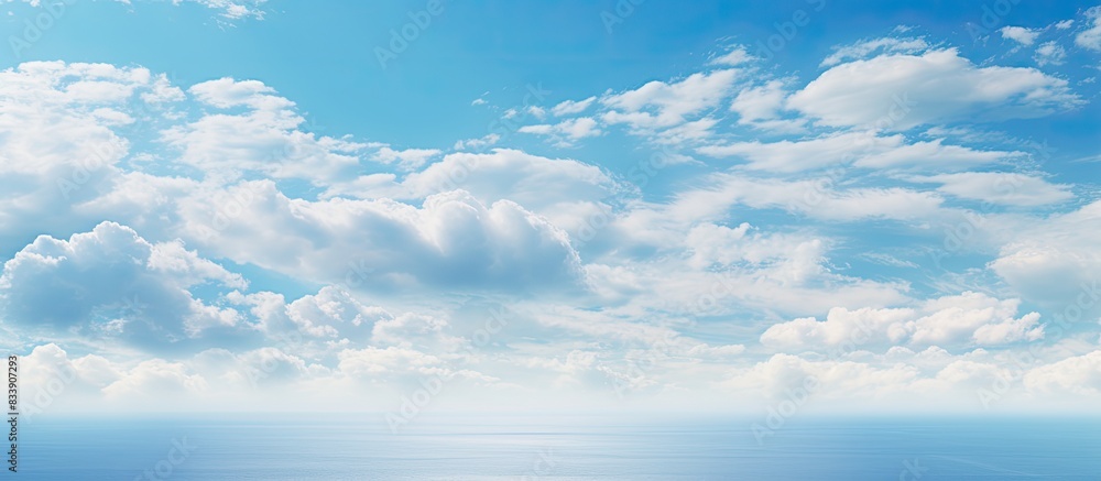 Poster Scenic sky with fluffy clouds above the ocean with copy space image.