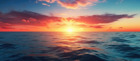 Fototapeta premium A stunning sunset with a picturesque horizon over the ocean, ideal for a copy space image.