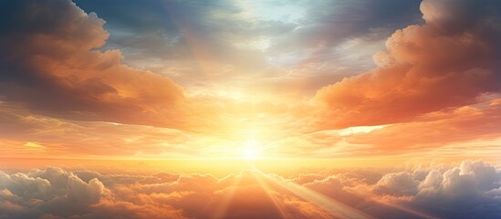 Fototapeta premium Appreciate the stunning sunset and sunrise scenery showcasing clouds, light rays, and atmospheric effects in a picturesque copy space image.