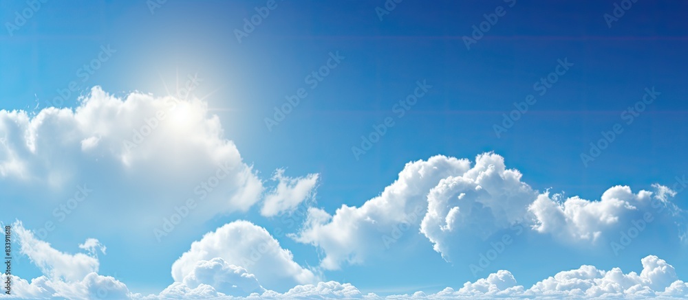 Poster sunny blue sky with a fluffy white cloud in a serene setting, ideal for a copy space image.
