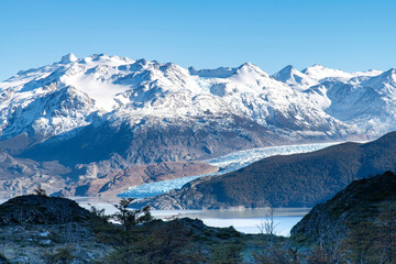 Early morning panoramic view over Lago Grey lake and terminus of Glacier Grey in Torres del Paine...